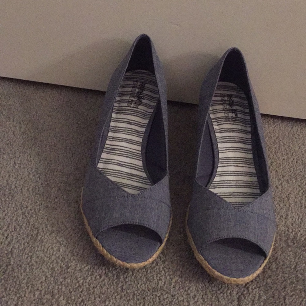 Blue wedge heels.